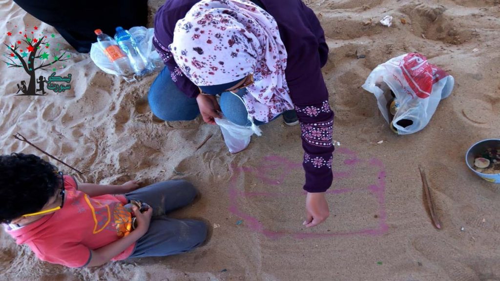 تعليم الفني الرسم على الرمال